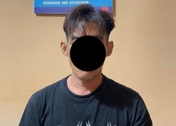 Pelaku AS (36) saat diamankan di Polsek Telanaipura, Kota Jambi, (Dok: Alpin)