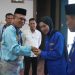 Staf Ahli Bupati Merangin Irsadi mewakili Bupati H. M. Syukur saat membuka Pelatihan Kader Lanjut Ke-V PC PMII Merangin di Aula Rumah Dinas Bupati Merangin, Bangko, Senin (15/12). (Dok: Rudi)