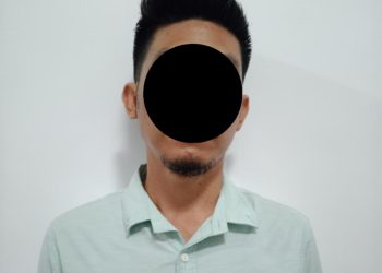 Pelaku penganiayaan berinisial BI (40) diamankan di Polsek Kota Baru setelah membacok seorang warga di kawasan Kenali Asam, Kota Jambi. (Dok: Alpin)