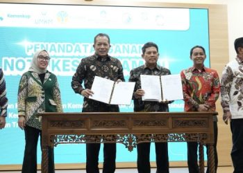 BPJS Kesehatan dan Kementerian Koperasi Republik Indonesia menandatangani Nota Kesepahaman penyelenggaraan Program JKN di sektor koperasi, Selasa (23/12). (Dok: BPJS Kesehatan)