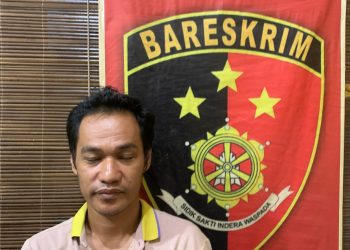 pelaku pemnganiayaan saat diamankan Polsek Pelayangan. (Dok: Alpin)