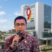 Kolase foto Kepala OJK Provinsi Jambi Yan Iswara dan gedung mahligai Bank Jambi. (Dok: Rahmat)