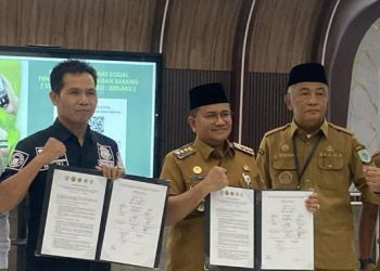 Polda Jambi bersama Pemkot Jambi saat mendukung penerapan sistem scan amal berbasis barcode guna memastikan transparansi dan keamanan pengelolaan donasi di ruang publik. (Dok: Alpin)