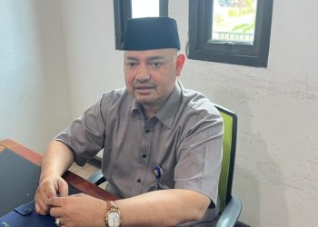 Kepala Biro Kesra Setda Provinsi Jambi, Amrulsyah saat dikonfirmasi diruang kerjanya. (Dok: Rahmat)