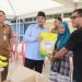 Bupati Tanjung Jabung Barat Anwar Sadat meninjau pelaksanaan pasar murah di Kuala Tungkal. (Dok: Diskominfo Tanjab Barat)