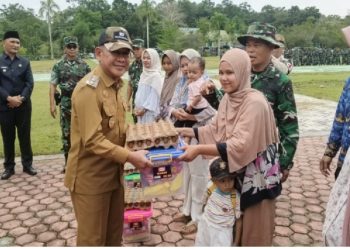 Wakil Bupati Merangin A. Khafidh menghadiri pembukaan Karya Bakti Kodim 0420/Sarko Tahun 2026 di Lapangan Gunung Kembang, Sarolangun, Jumat (29/5). (Dok: redaksi)