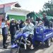 Wali Kota Jambi, Maulana, melepas operasional 12 unit gerobak motor Program Operasional Pengangkutan Berbasis Masyarakat (OPBM) saat launching Program Kampung Bahagia di Kelurahan Kebun Handil, Kecamatan Jelutung, Minggu (24/5/2026). (Dok: Rahmat)