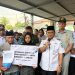 PT Jasa Raharja Kanwil Jambi bersama Wali Kota Jambi dan jajaran terkait menyerahkan santunan kepada ahli waris korban kecelakaan lalu lintas yang terjadi di Jalan Lingkar Barat III, depan Terminal Alam Barajo, Rabu (20/05/2026). (Dok: Humas Jasa Raharja)