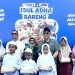 JNE dan TIKI menyambut Idul Adha 1447 H dengan menyembelih 30 ekor sapi kurban dan membagikan ribuan paket daging kepada masyarakat. (Dok: JNE Ekspres)