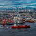 Ilustrasi deretan peti kemas di terminal pelabuhan mencerminkan geliat ekonomi nasional yang terus bergerak. (Dok: Redaksi)