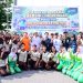 Kapolda Jambi Irjen Pol Krisno H siregar bersama Wakil Wali Kota Jambi Diza Hazra Aljosha dan peserta lainnya saat melakukan aksi bersih lingkungan dalam kegiatan Road to Presisi Merdeka Run 2026 di kawasan Ancol Kota Jambi. (Dok: Alpin)