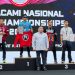 Muhammad Zaki (Izak) menunjukkan medali emas dan trofi juara usai meraih podium tertinggi pada ajang PERTACAMI National MMA Championships 2026 di Megamendung, Bogor. (Dok: Humas KONI Provinsi Jambi)