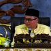 Ketua DPRD Kota Jambi, Kemas Faried Alfarelly, menyampaikan sambutan dalam Rapat Paripurna Istimewa HUT ke-80 Pemerintah Kota Jambi dan Hari Jadi Tanah Pilih Pusako Betuah ke-625 di Ruang Paripurna Swarna Bhumi DPRD Kota Jambi, Selasa (2/6/2026). (Dok: Rahmat)