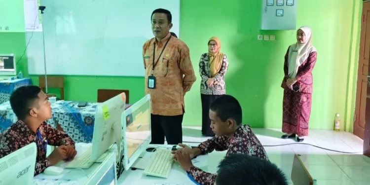 Kabid Pembinaan SMP Dinas Pendidikan Kota Jambi, Zul Afni (dok: Dinas Pendidikan Kota Jambi)